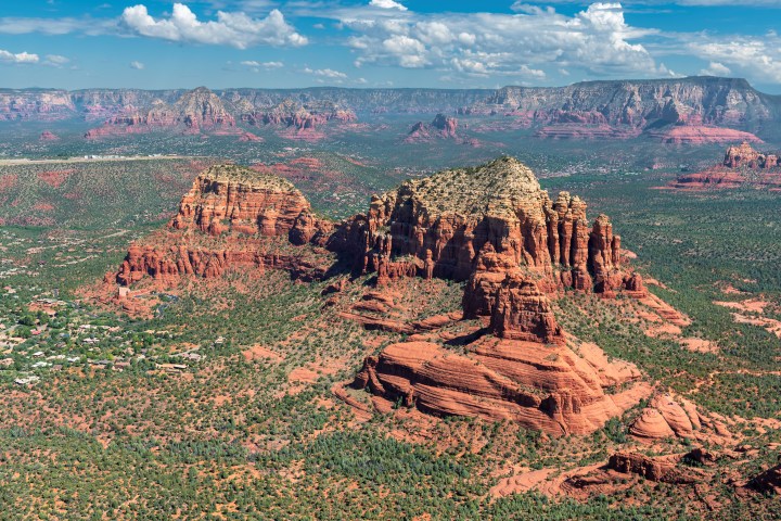 Aerial view of scenic Cathedral Rock formation at Oak Creek in Sedona, Arizona,